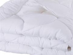 White comforter for household laundry service